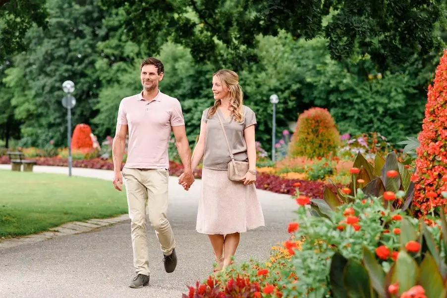 Couple holding hands in the park